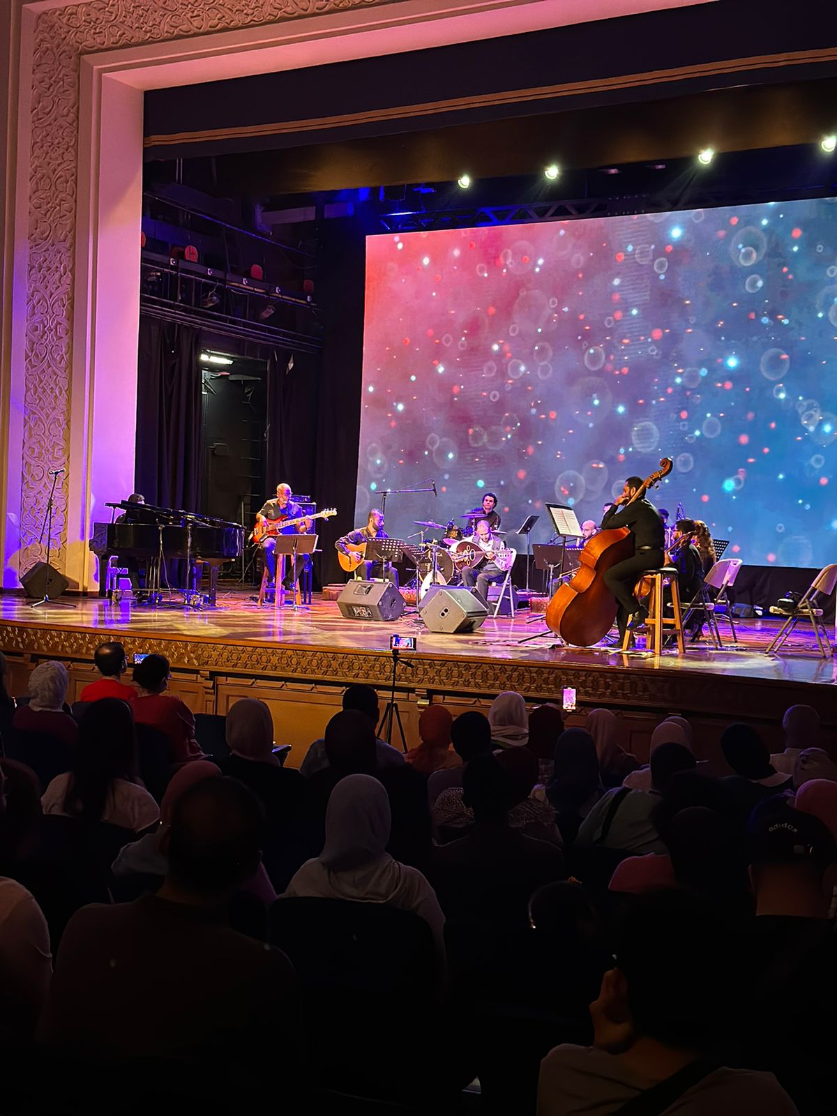 Picture of the musicians playing on stage 